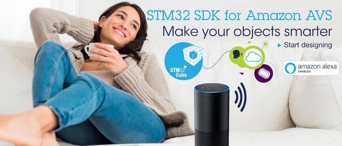 A woman on a sofa listening to a smart speaker