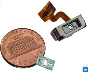 Optical Light Engine with a coin for size comparison 