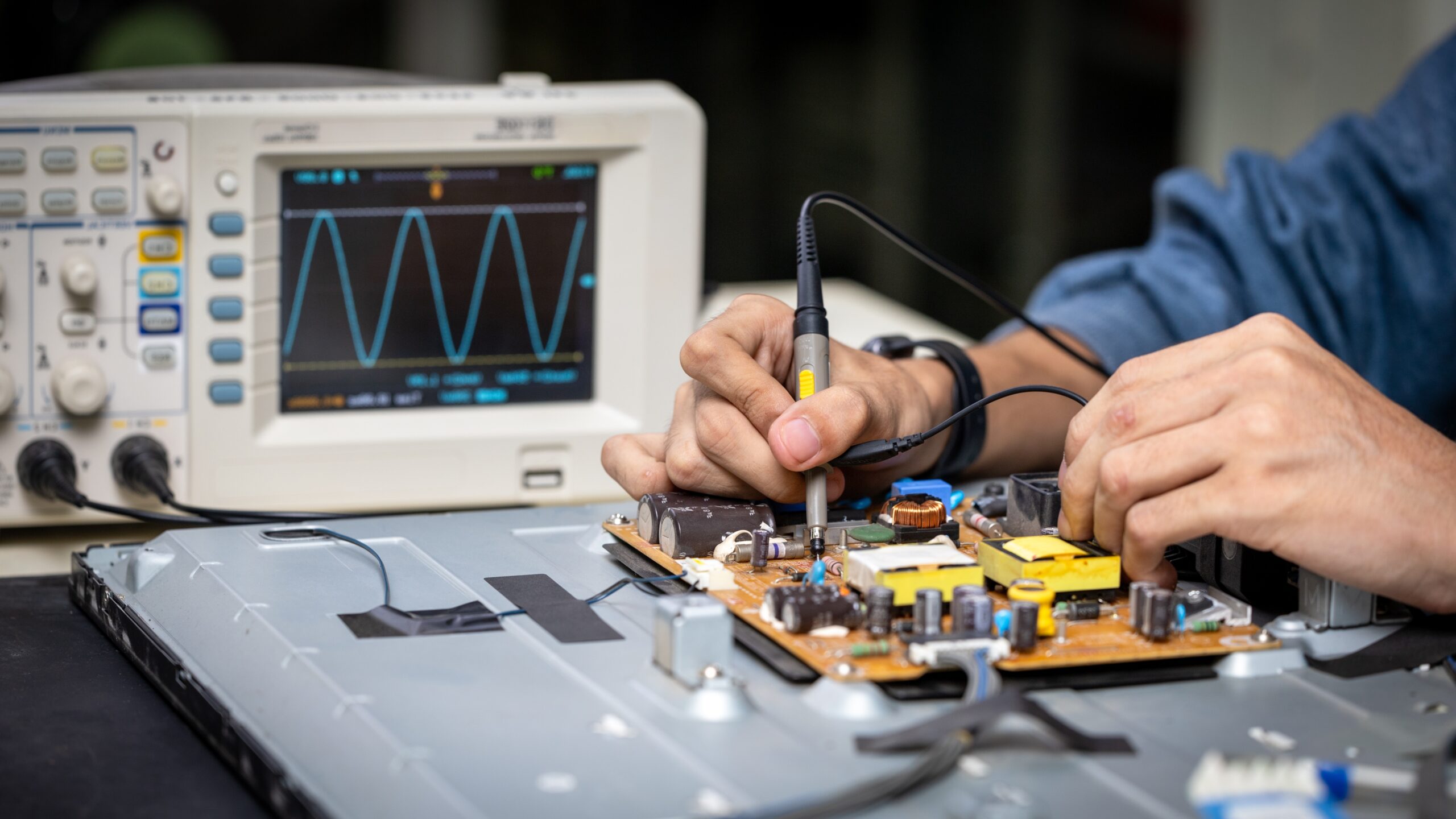 Electronic technician,banner, hands repairing electronic devices The use of modern one-stop service center concepts
