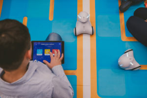 A child controlling the Photon with a tablet