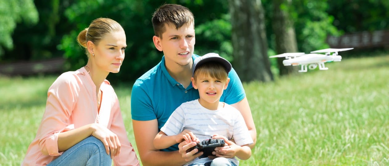 A family playing with a drone