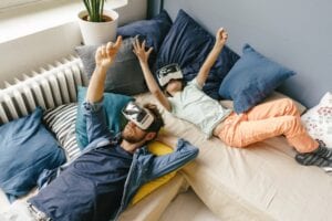A father and daughter using VR