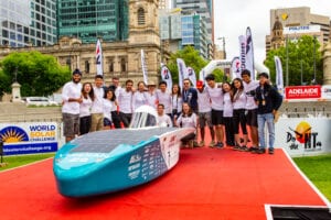 The Blue Sky Solar Racing team after crossing the finish line in Adelaide, Australia