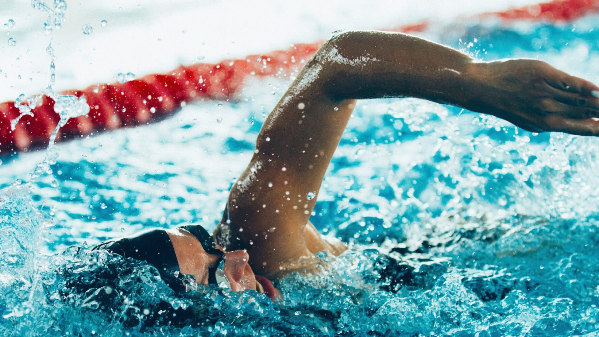 Freestyle swimming competitor in action