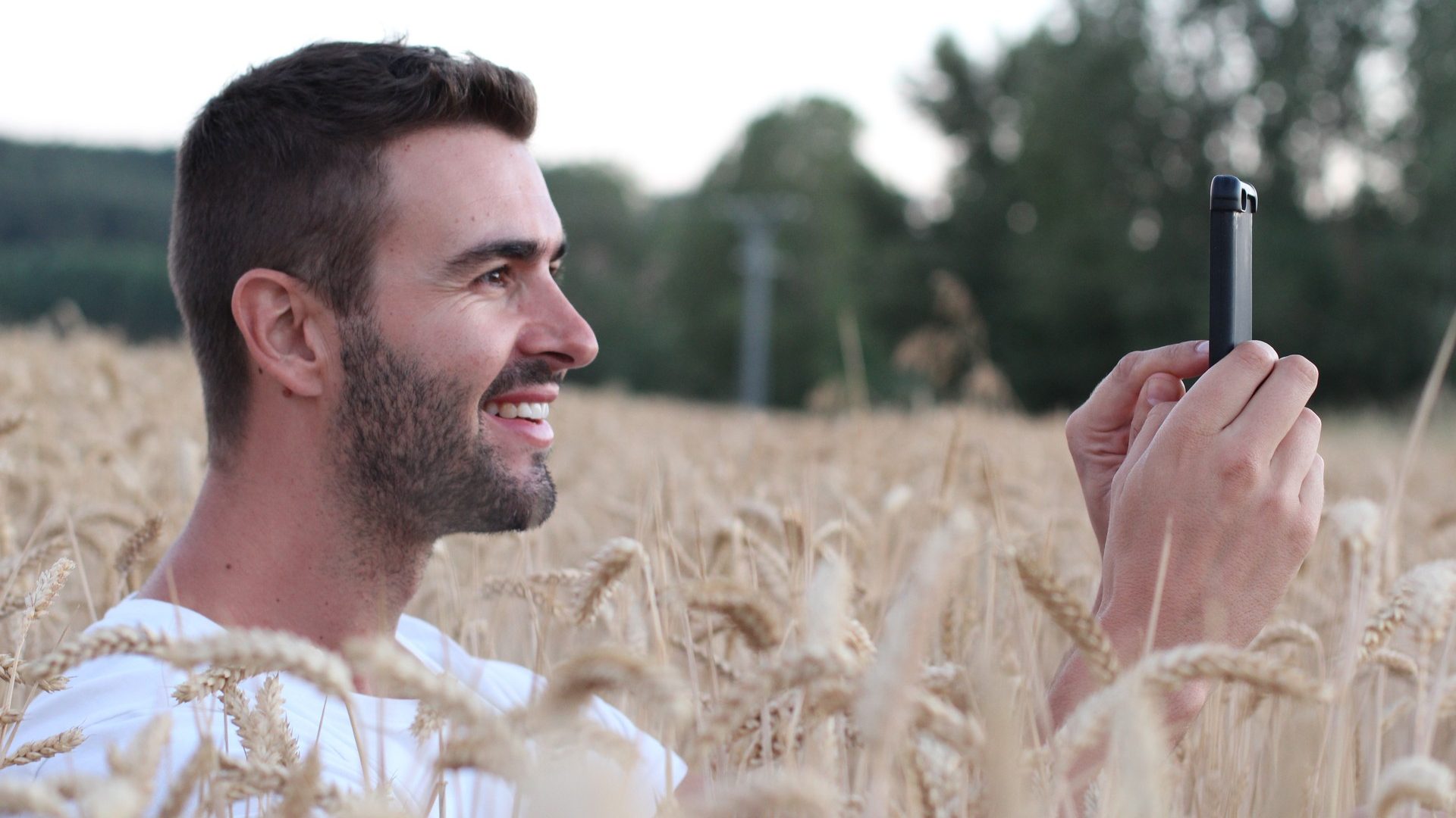 The hit augmented reality smartphone app "Pokemon GO" shows a Pokemon encounter overlain on a real world wheat field
