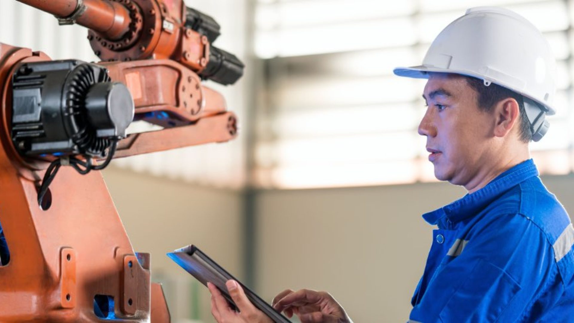 Machine condition monitoring and predictive maintenance concepts. Asian Senior Male Industrial Engineer working in automobile industry. Has has expertise of Robotic arc welding sensors and programming in industrial applications.