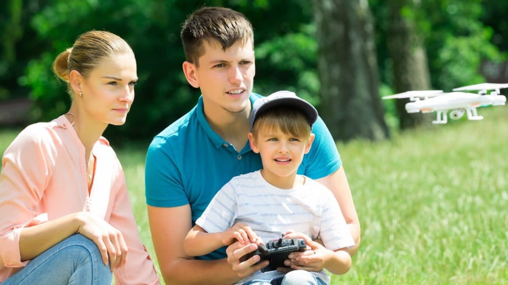 A family playing with a drone