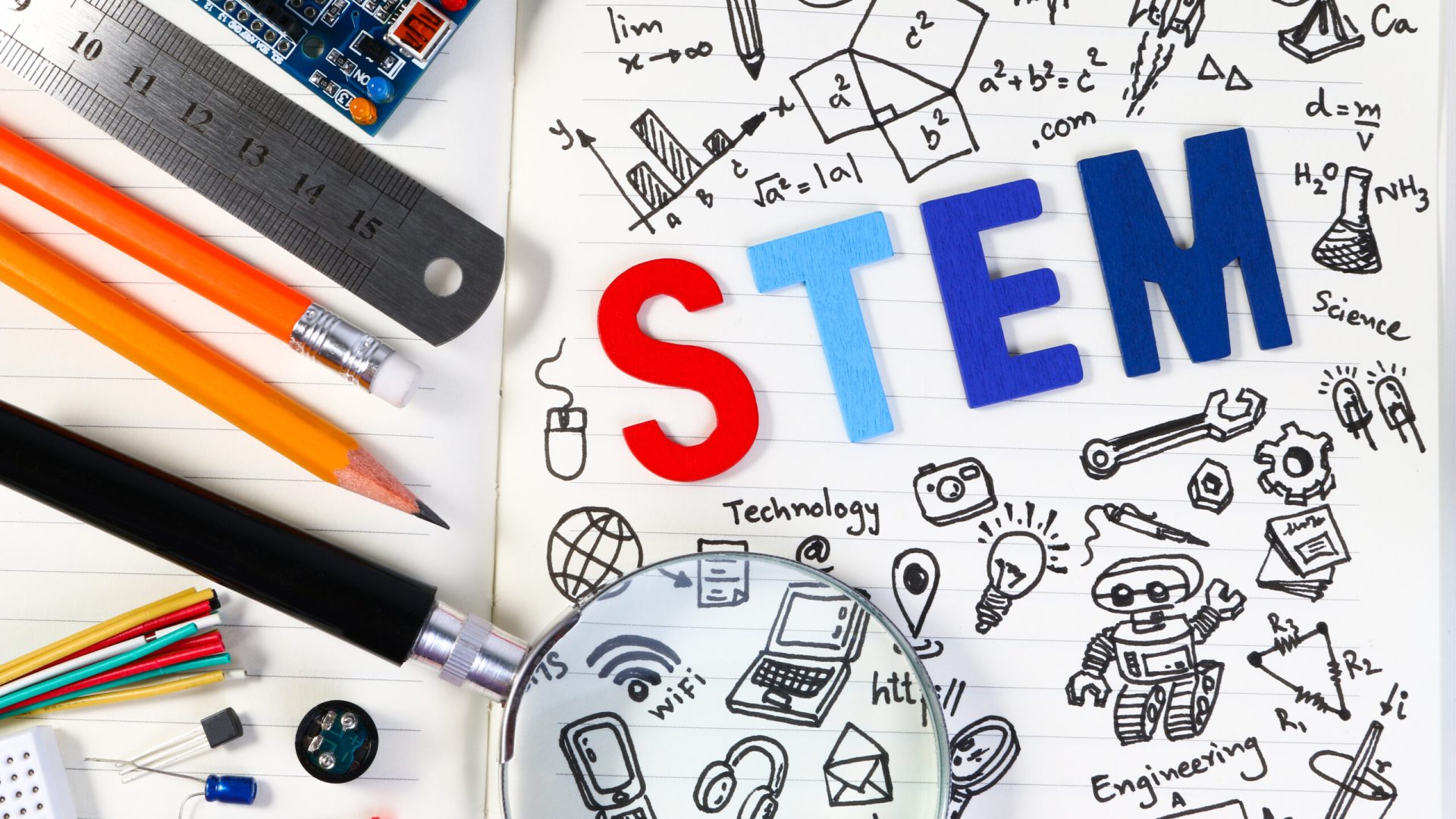 STEM education. Science Technology Engineering Mathematics. STEM concept with drawing background. Education background.STEM education. Science Technology Engineering Mathematics. STEM concept with drawing background. Magnifying glass over education background.