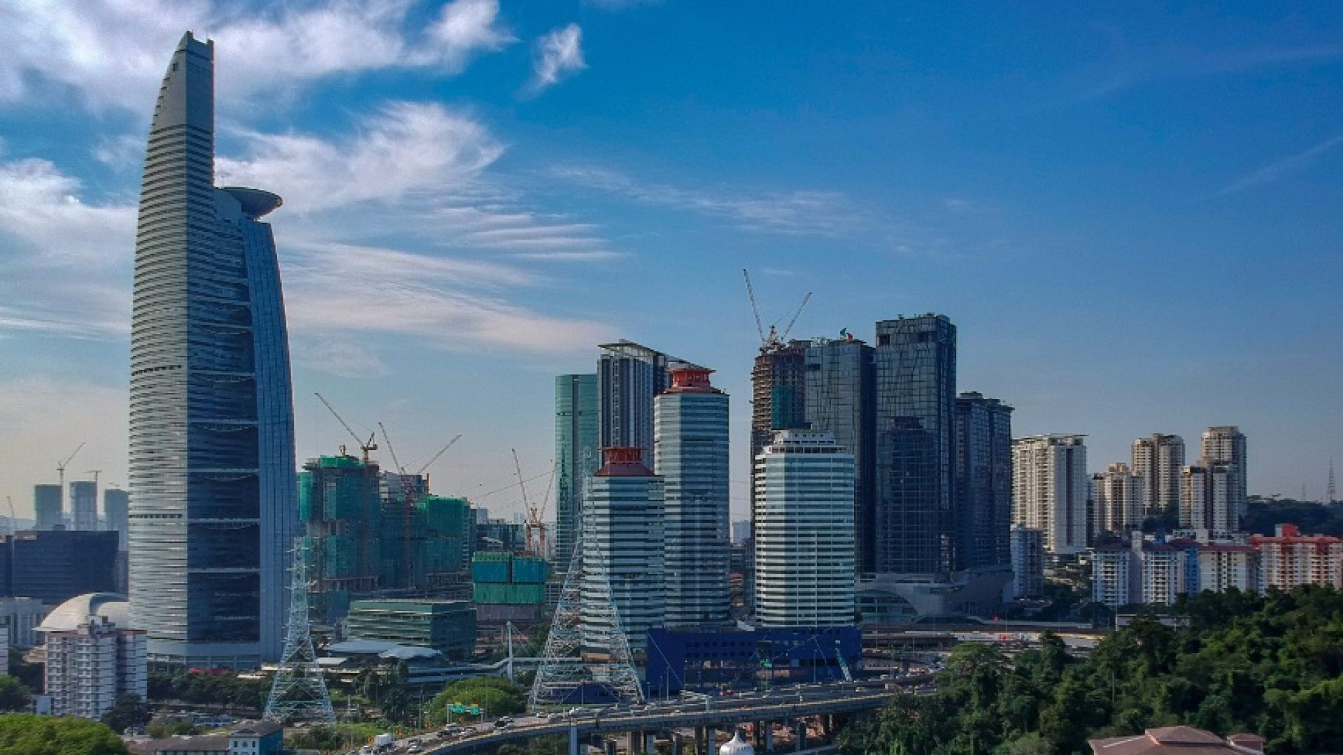 Aerial view of Petaling Jaya, Malaysia skyline and the elevated Kerinchi highway with traffic jam.; Shutterstock ID 1057664288; purchase_order: 1106262587; job: ; client: ; other: